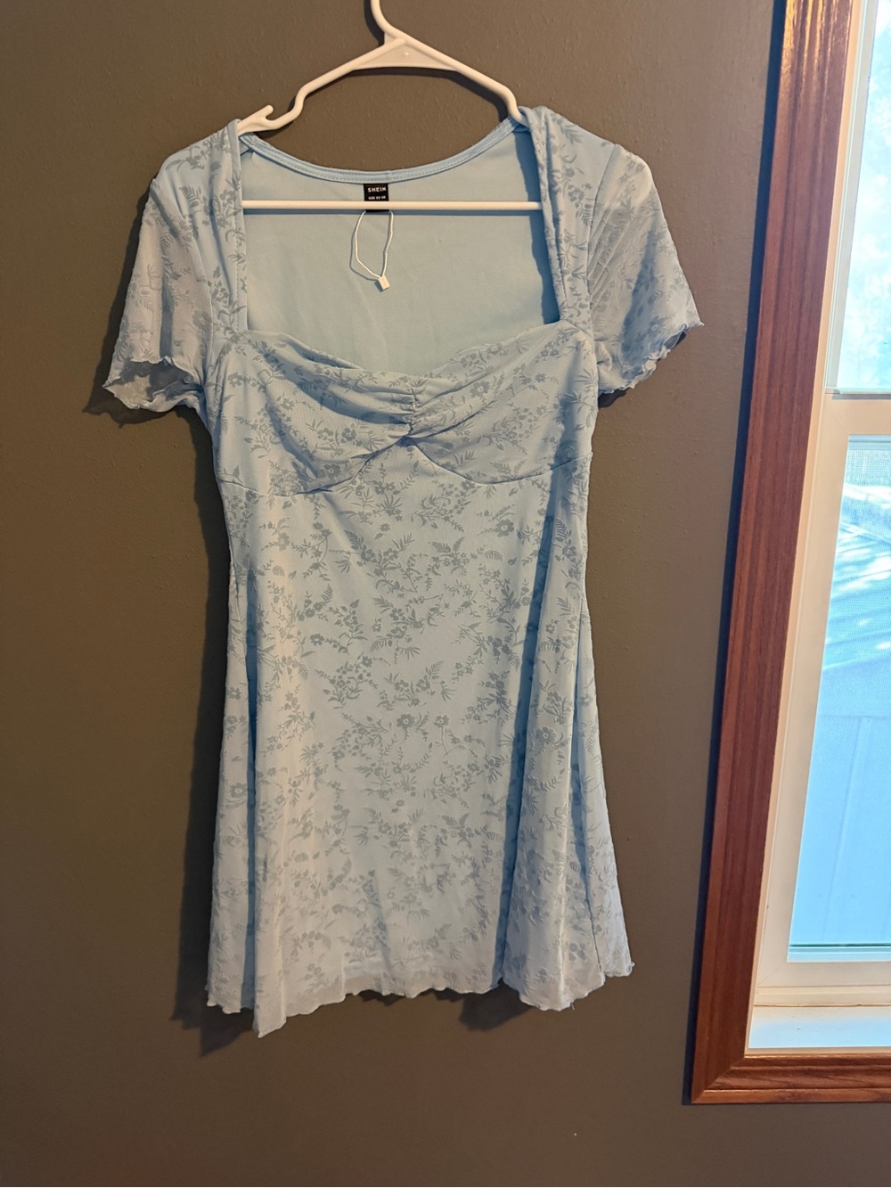 Label Inside Light Blue Garment